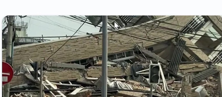 Collapsed building with earthquake damage
