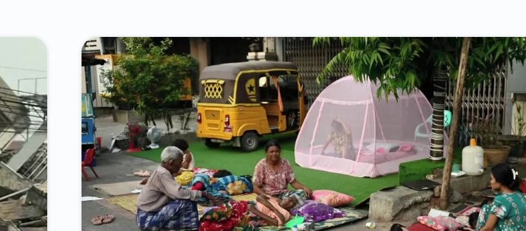 Displaced families in temporary shelter